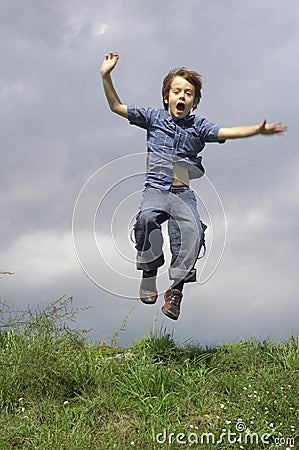 Young Boy Jumping And Shouting Royalty Free Stock Photography - Image