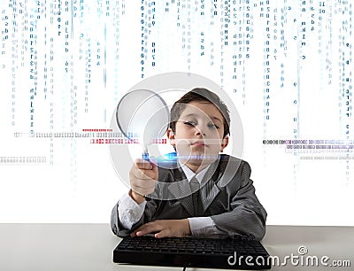 Young boy looking for malicious code Stock Photo