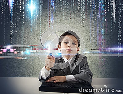 Young boy looking for malicious code Stock Photo