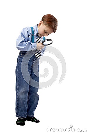 Young boy with magnifer Stock Photo