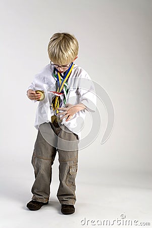 Young boy with medals of honour Stock Photo