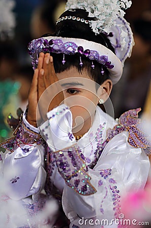 Young boy at novice ceremony, Myanmar Editorial Stock Photo