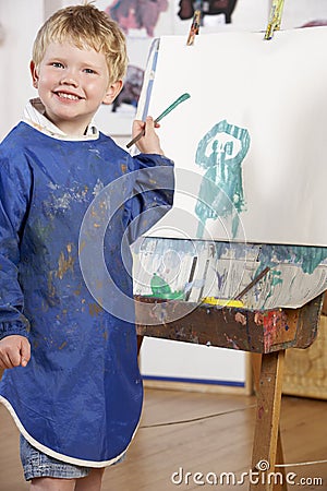 Young Boy Painting Stock Photo