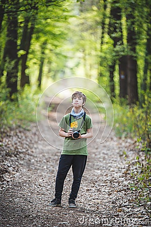 Young boy photographer with camera Stock Photo