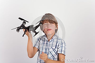 Young boy playing with hist drone Stock Photo