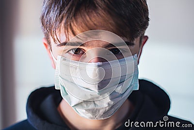 Young boy with protective mask infection fear concept - quarantine at home Stock Photo