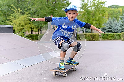 Young boy showing off on his skateboard Stock Photo