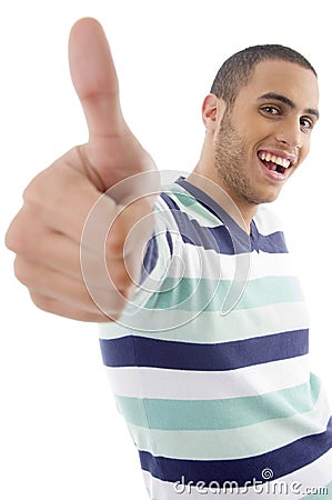 Young boy showing thumbs up Stock Photo