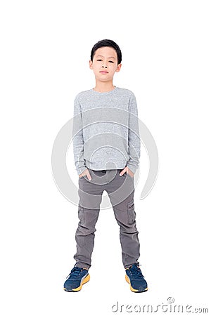 Young boy standing over white Stock Photo