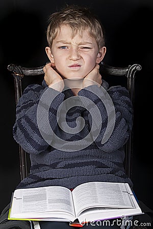 Young boy studying Stock Photo