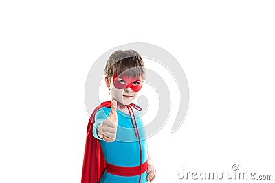 Young boy superhero giving you a thumbs up. Stock Photo