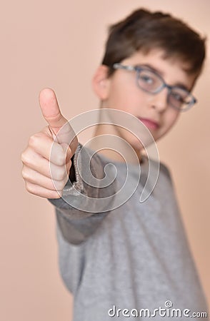 Young boy with thumb up Stock Photo