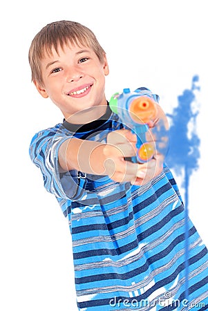 Young boy with water gun Stock Photo