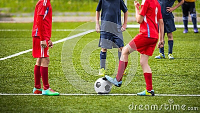 Young boys children in uniforms playing youth soccer football Editorial Stock Photo