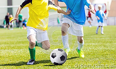 Young boys playing soccer match. Youth football tournament for young boys Editorial Stock Photo