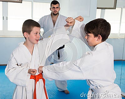 Young boys training in pair Stock Photo