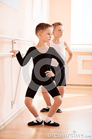 Young boys working at the barre Stock Photo