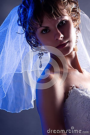 Young bride wearing a white wedding dress w Stock Photo