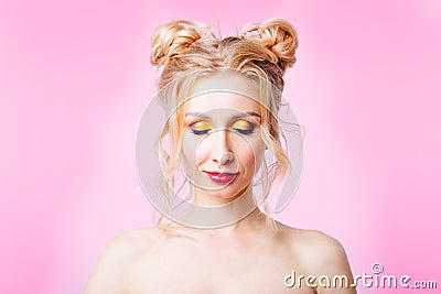 Young girl on a pink background Stock Photo