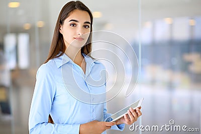 Young brunette businesswoman or student girl looking at camera Stock Photo