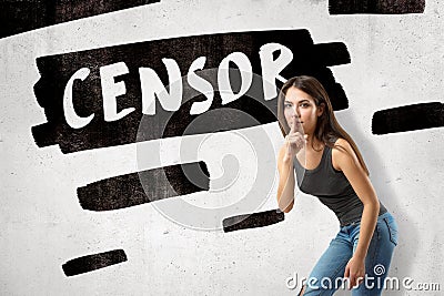 Young brunette girl wearing casual jeans and t-shirt showing silent gesture with `CENSOR` sign on white background Stock Photo