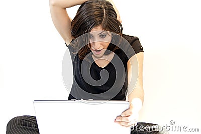 Young Brunette Woman Finds Surprise on Computer Stock Photo