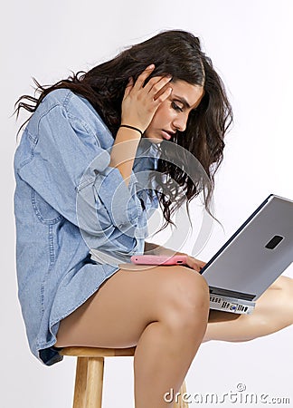 Young Brunette Woman Works At Computer Stock Photo