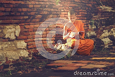 Young Buddhist novice monk Stock Photo