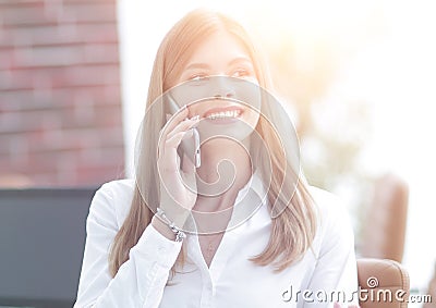 Young buisnes woman talking on a mobile phone. Stock Photo