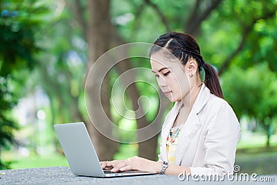 Young business asian woman using laptoprk Stock Photo