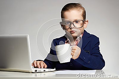 Young business child with computer Stock Photo