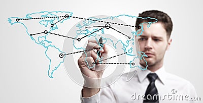 Young business man drawing a global network Stock Photo