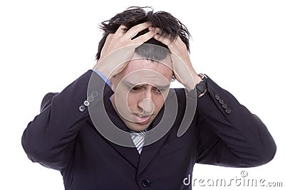 Young business man with a headache Stock Photo