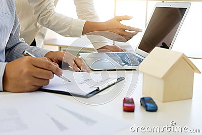 Young Business man insurance agent show document contract Stock Photo