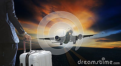 Young business man and luggage suitcase standing with passenger Stock Photo