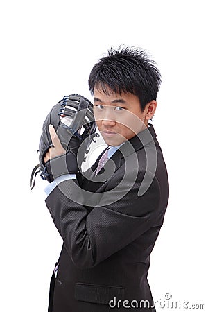 Young Business Man pitching baseball Stock Photo