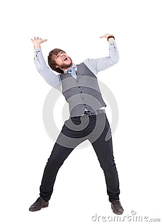 Young business man pushing something up Stock Photo