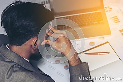 Young business man to Work fatigue Stock Photo