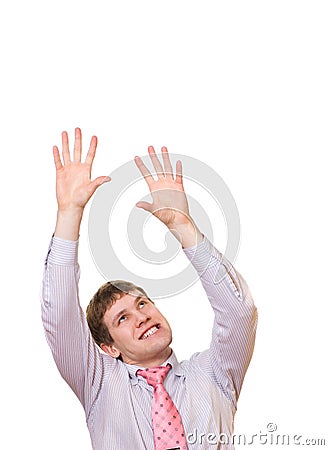 Young business man trying to grab something Stock Photo