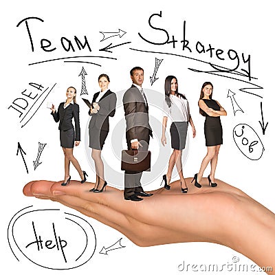 Young business people in humans hand Stock Photo