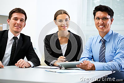 Young business people in an office Stock Photo