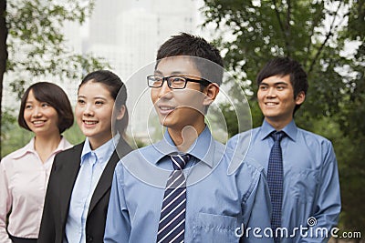 Young business people in the park, portrait Stock Photo