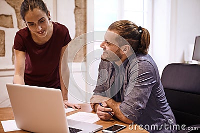 Young business woman answering his question Stock Photo