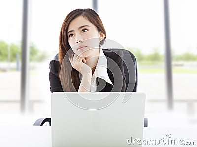 Young business woman feel unhappy in the office Stock Photo