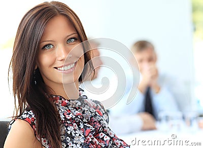 Young business woman in an office Stock Photo