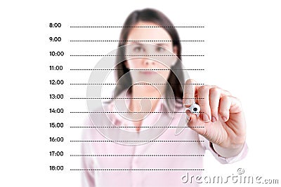 Young business woman writing blank appointment schedule. Stock Photo