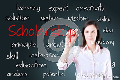 Young business woman writing scholarship concept Stock Photo