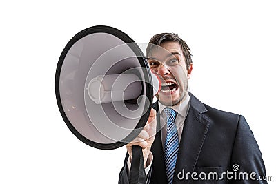 Young businessman is announcing a message and shouting to megaphone. Isolated on white background Stock Photo