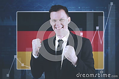 Successful businessman with German flag Stock Photo