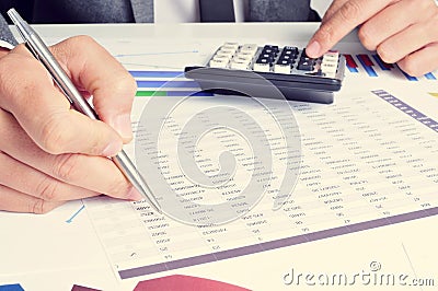 Young businessman checking accounts Stock Photo